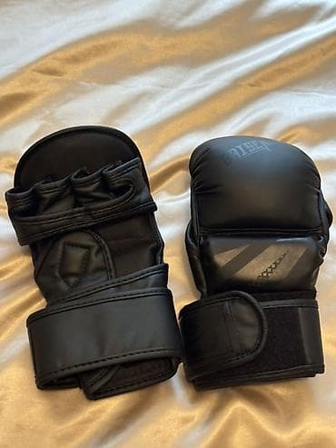 idma: Məhsul: Boks/MMA məşq əlcəkləri – qara rəng Xüsusiyyətlər: - Dizayn — 2