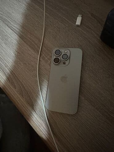 14 pro qiymeti irşad: IPhone 15 Pro, Gümüşü, Simsiz şarj — 1