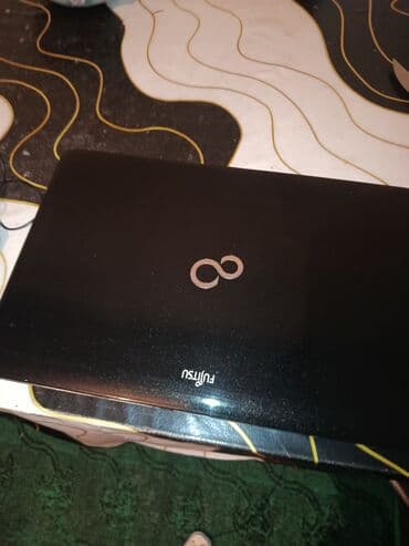 Fujitsu noutbuk Xüsusiyyətlər: - Marka: Fujitsu - Korpusu qara