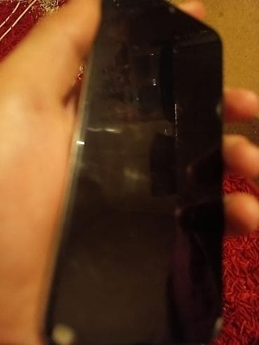 Smartfon - Sensorlu ekranlı, qara rəng korpus - Ön tərəfdə kamera və