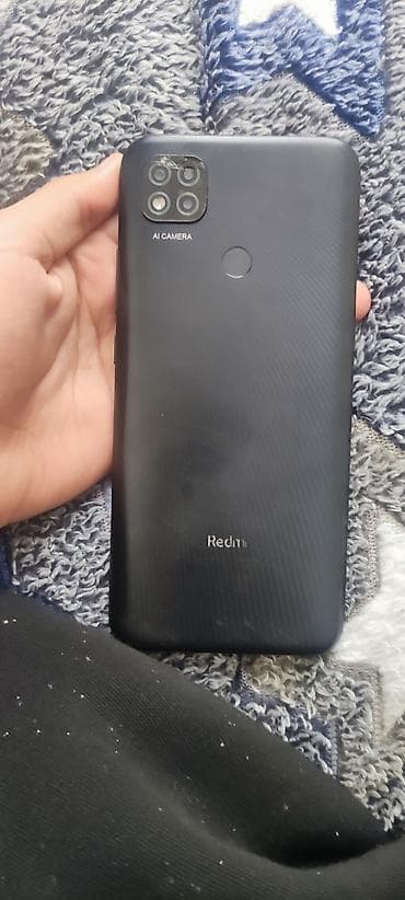 zerbeye davamli telefonlar: Redmi 9C, 128 GB, rəng - Qara, Barmaq izi — 2