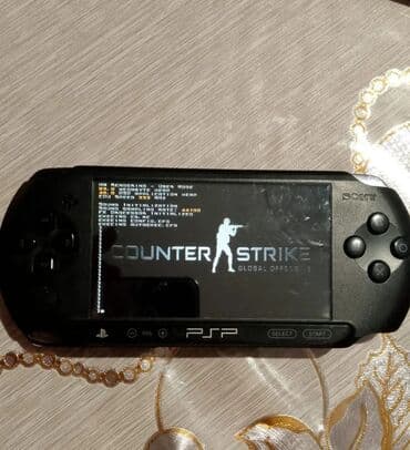 pleşteyşn: Sony psp oyun konsolu 8 GB yadas karti icinde 9 oyunu var — 1
