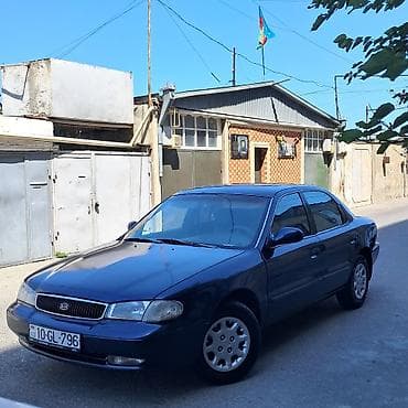 sud ceni: Kia Clarus: 2 l | 1997 il Sedan — 1