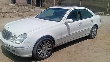 bmw e 38: Mercedes-Benz E 320: 3.2 l | 2004 il Sedan — 2