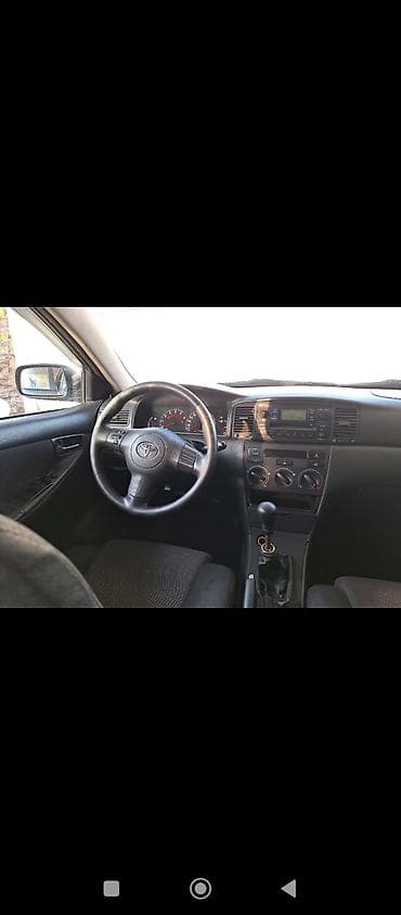 Toyota Corolla (E120) sedan - Kuzov: sedan, tünd boz rəng - Yan lalafo.az -da Toyota Corolla (E120) sedan - Kuzov: sedan, tünd boz rəng - Yan