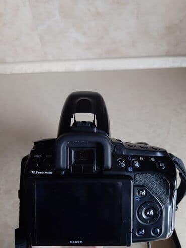 knopkalı: Fotoaparat Sony a500. Probeqi azdır. Şəkil çəkmək üçün knopkası — 9