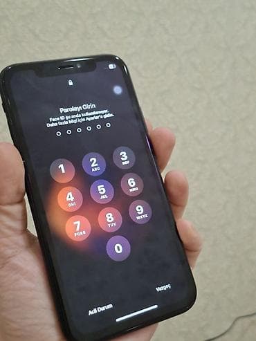aple: IPhone Xr, 128 GB, Qara, Face ID — 2