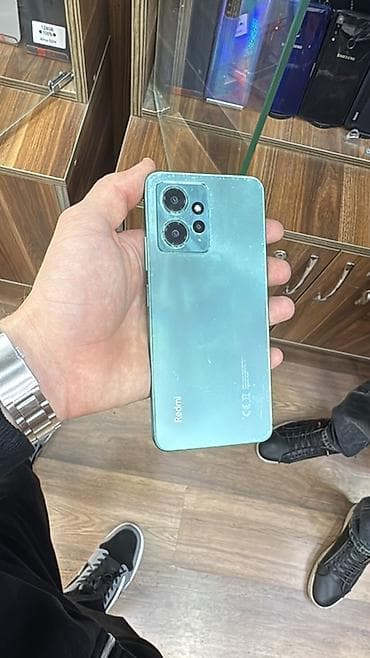 Redmi smartfon - Model: Redmi (seriyada iki rəng: mavi və qara) -