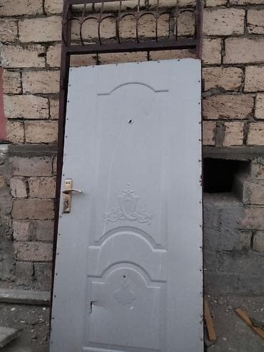 Təmir və tikinti: Çox ağır qapıdır. Üstündə dəmir rəykalar hədiyyə — 2