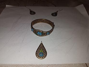 qızıl zinət eşyaları: Müxtəlif komplektler,qolbaqlar və s.qramı 4,50 — 4