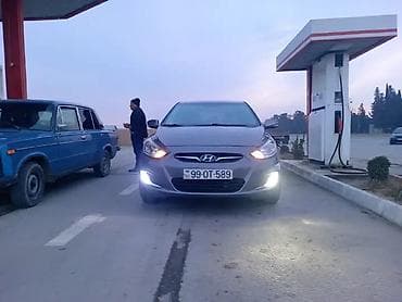 savet maşın: Hyundai Accent sedan - Kuzov: sedan, boz rəng - Mühərrik: benzin - — 1