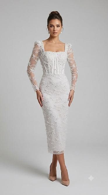 Zərif və eleqant dizayna malik ağ rəngli ziyafət/nişan libası. Model — 1