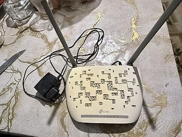 tp link qiymetleri: TP-Link TD-W8961N – 300Mbps Wireless N ADSL2+ Modem-Router — 2