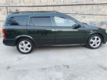 ремонт сидений авто: Opel Astra Caravan (universal) – tünd yaşıl rəng • Kuzov: universal — 7