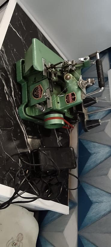 elektrik naqilleri: Təzə kimi Sənaye tipli overlok tikiş maşını – OESON markası — 1