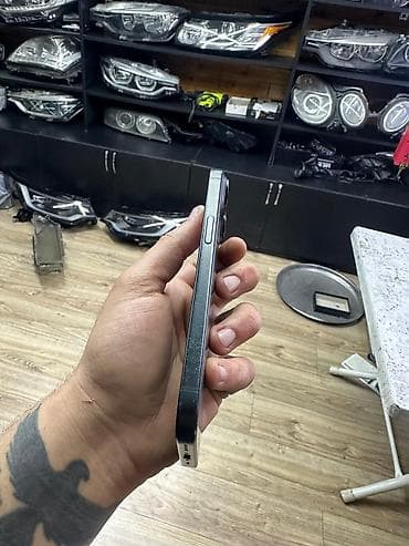 Video oyunlar və konsollar: IPhone 15, 128 GB, Black Titanium, Face ID — 4