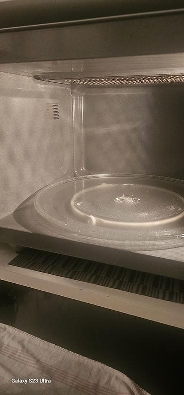 Кухонные плиты и варочные поверхности: Микроволновка Panasonic, Отдельностоящая, цвет - Серебристый — 2