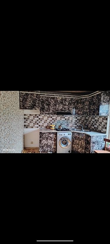 Mətbəx mebel dəsti – künc yerləşimli, mərməri xatırladan tünd rəngli lalafo.az -da Mətbəx mebel dəsti – künc yerləşimli, mərməri xatırladan tünd rəngli