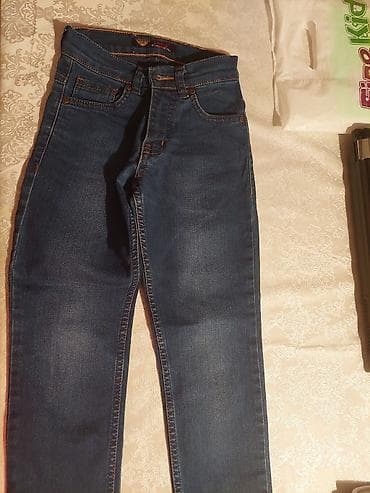 2 yas: Cins şalvar.5man.uzunluğu 70sm ikisi bir şəkildə olan 5/6 yasa — 5