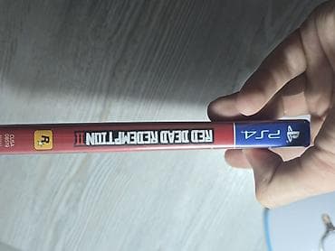 dvd disk: Red Dead Redemption 2 (PS4) / İdeal vəziyyətdə ​Qiymət: ​38 AZN Red — 9