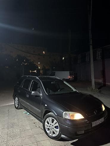 prius qapi: Opel Astra Caravan (Universal) – qara rəng Xüsusiyyətlər: - Kuzov — 5