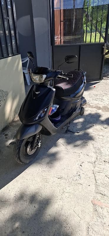 moto bazar: Skuter – şəhər içi rahat və qənaətcil hərəkət üçün Xüsusiyyətlər: - — 2