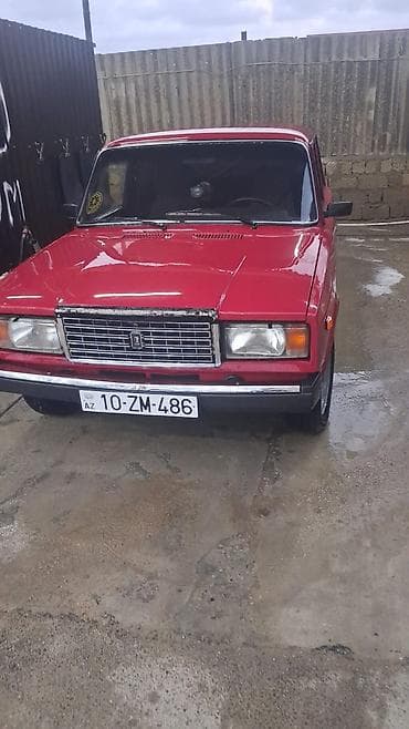 bmw satilir: VAZ 2107, qırmızı sedan Xüsusiyyətlər: - Kuzov: 4 qapılı sedan — 4