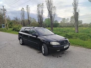 Opel Astra: 1.6 l | 1999 il 465123 km Universal — 2