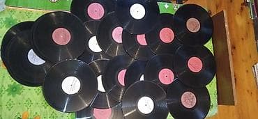 2 dollar satisi: Plastinkalar biri 2 manat — 1