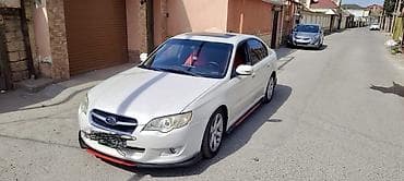 satdiq uaz: Subaru Legacy (sedan), ağ rəng, tam ölçülü sedan kuzovu — 9