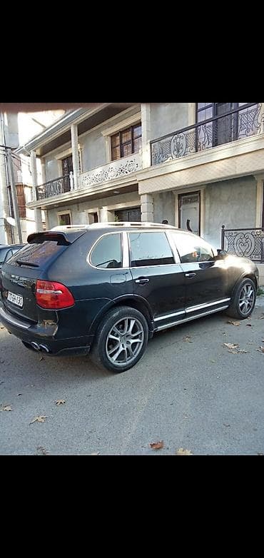 daxili kredit avtomobil: Porsche Cayenne (1-ci nəsil, restyling) – qara rəngli, tam ölçülü — 4
