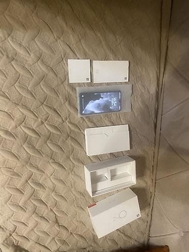 xiaomi mi 9 se 2020: Xiaomi Mi 9 SE, 64 GB, rəng - Qara, 
 Sənədlərlə — 2