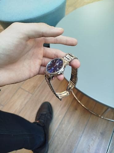 Zərgərlik əşyaları: Qol saatı, Swiss — 4