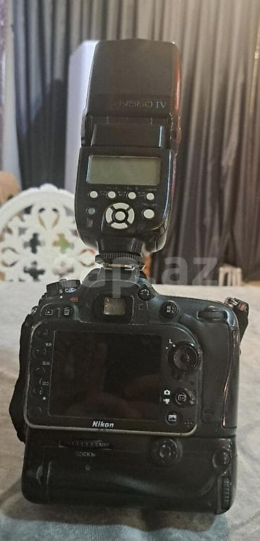 Nikon D7100 DSLR fotoaparat dəsti Tərkib: - Nikon D7100 gövdə (şutter — 2