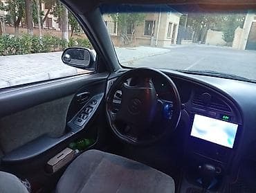 lider disk: Hyundai Elantra: 2 l | 2003 il Sedan — 7