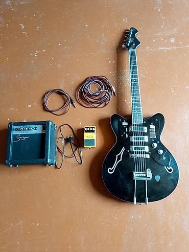 elektro gitarlar: Salam tək inkubator o,qiymətə satilir əlavə over drive 200 manat ses — 9