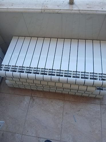 ARadiator satilir. 5 azn 1 dilim. 91 dilimdi. 15 seksiya, 10 seksiya
