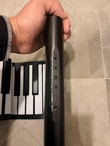 Daşınan qatlanan rəqəmsal piano (roll-up keyboard) yenidiler bagli say — 1