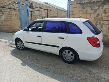 дом на колесах turbo az: Skoda Fabia Combi, ağ rəng, universal kuzov. Özəlliklər: - Geniş — 3