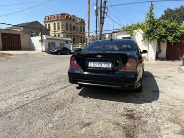 Чехлы: Chevrolet Evanda: 2 л | 2005 г. 300000 км Седан — 2