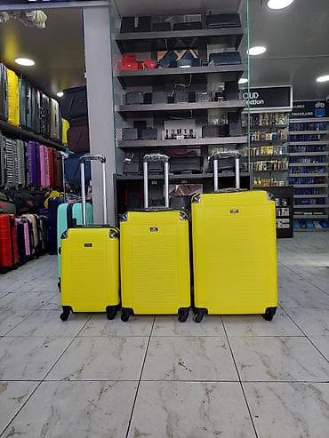 Çamadanlar: Sərnişin çamadan dəsti – 3 ölçü, parlaq sarı rəng - Ölçülər: kiçik — 1