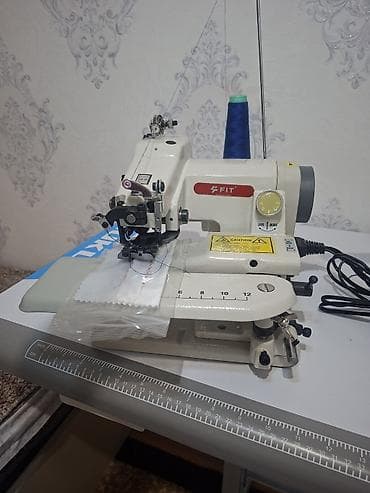 çarx: FIT markalı sənaye tipli uzdən tikiş/overlok maşını Xüsusiyyətlər: - — 4