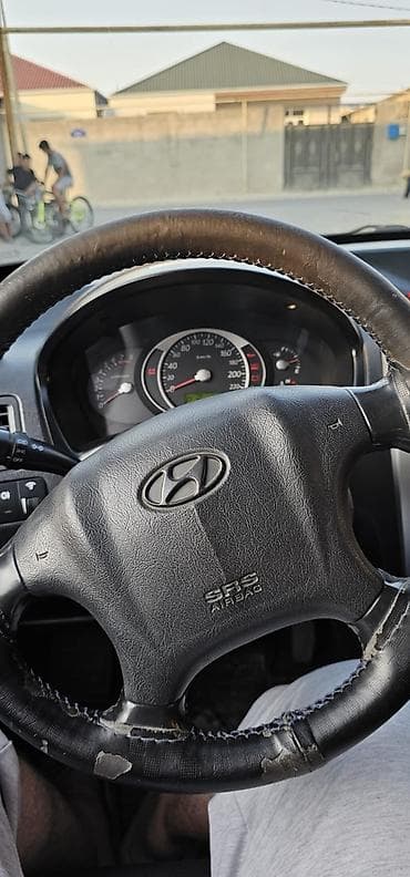 teker 19: Hyundai Tucson: 2.7 l | 2006 il Ofrouder/SUV — 9