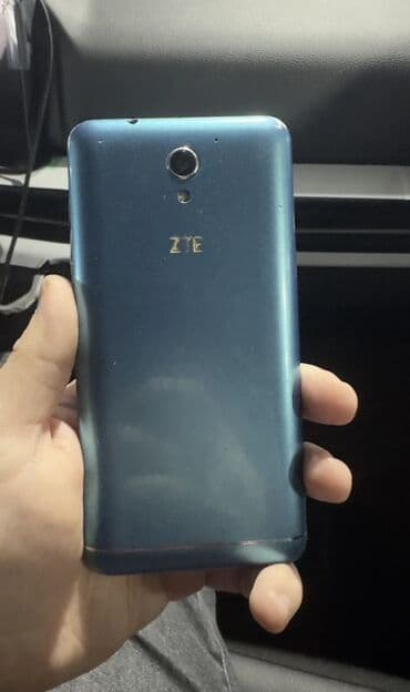 телефон fly с хорошим аккумулятором: ZTE v889m, 512 GB, rəng - Mavi, Sensor — 5