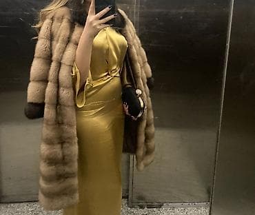 Üst geyimi: Material: Norka, boynu ve qollari sobol Razmer:M-L Brend:Femina — 1