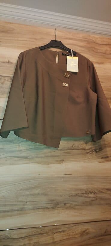 yupqa kofta: Teze xaki reng kofta.italya.geyinilmeyib.dest olub.şalvari istifade — 2