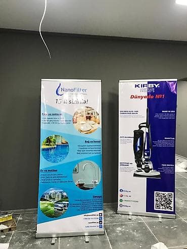 Çap və reklam həlləri – roll-up baner, brend vitrin/treyler örtükləri