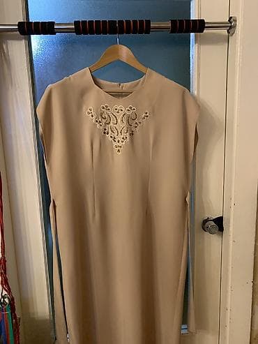 Şəxsi əşyalar: Paltar təzədir.Geyinilməyib.Ölçü: L — 3