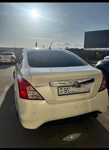 мото: Nissan Sunny: 1.5 л | 2014 г. Седан — 3