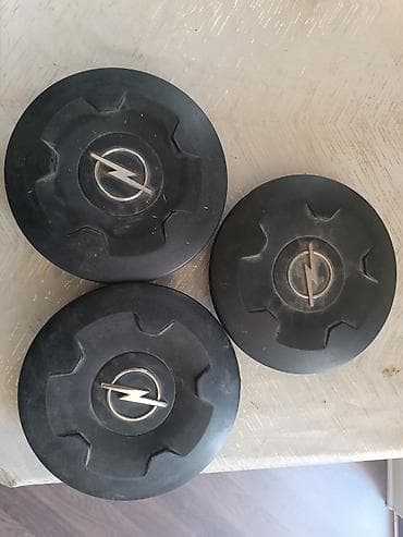 Opel ehtiyat hissələri dəsti - Disk mərkəz qapaqları: 3 ədəd